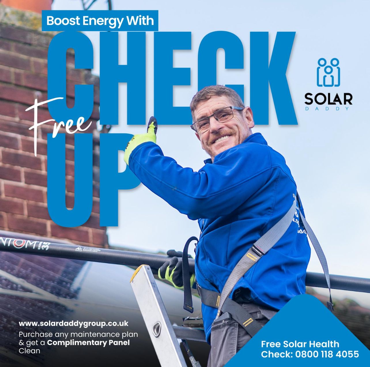 A man in a blue jacket is standing on a ladder