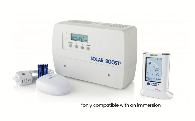 A solar boost device is sitting next to a thermostat.