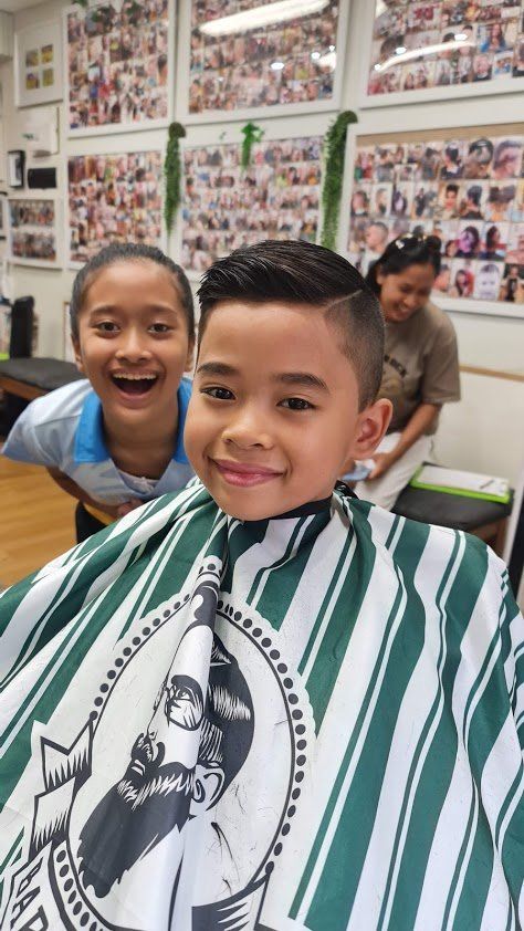 Cute Little Boy Done With His Haircut — Barbers in Darwin, NT