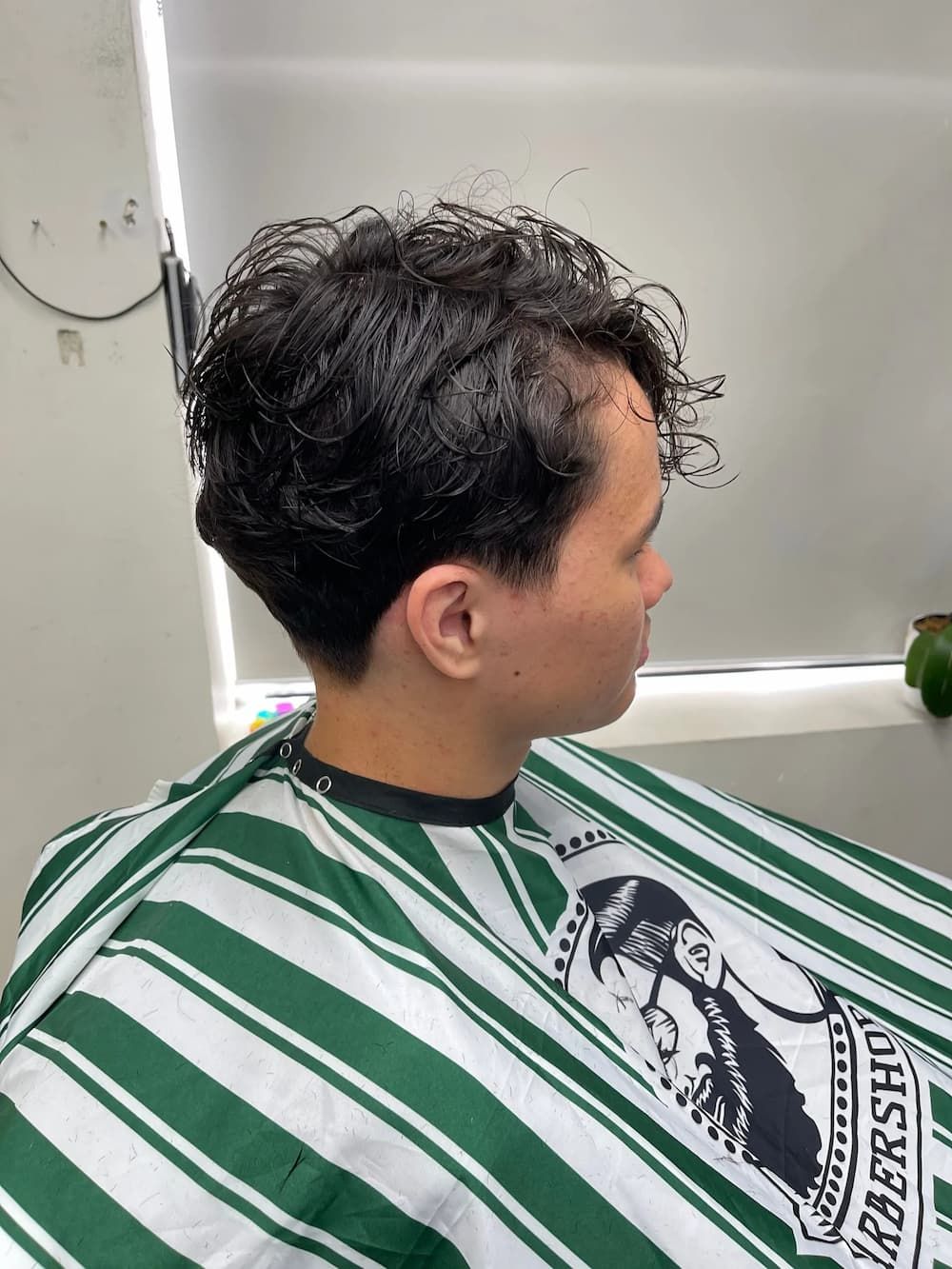 Man with Wavy Hair — Barbers in Darwin, NT