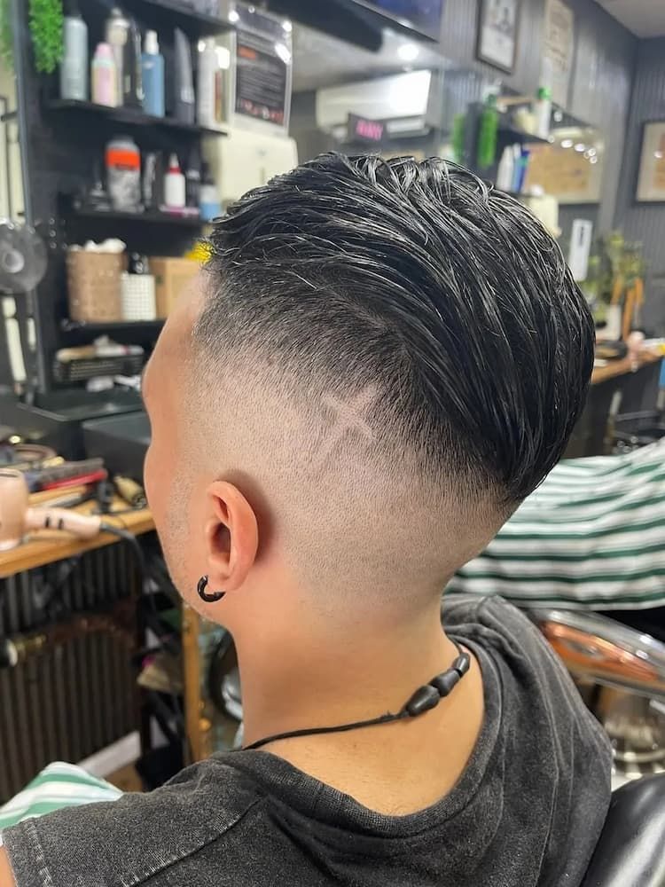 Man Has a Cross Shaved Into His Head — Barbers in Darwin, NT