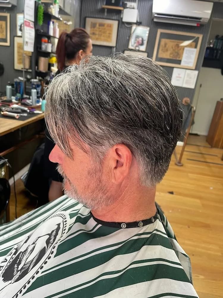 Man with Grey Hair Getting a Haircut — Barbers in Darwin, NT