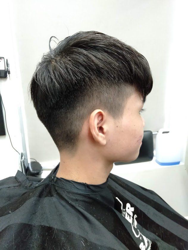 Boy in His Newly Cut Hair — Barbers in Darwin, NT