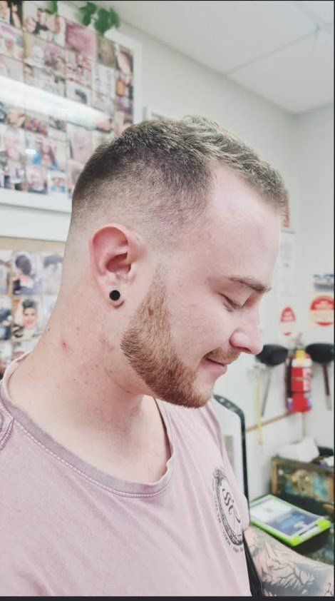 Man With Earrings Haircut Style — Barbers in Darwin, NT