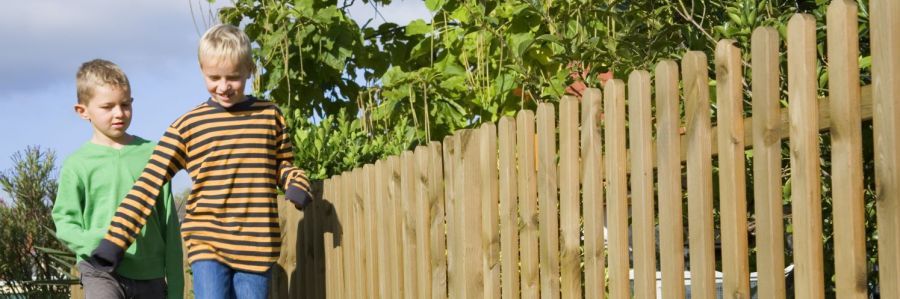 Children walking by our professional fencing in Research