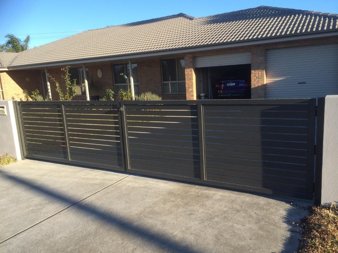 A House With a Sliding Gate in Front of It — Hunter Valley Lattice in Kurri Kurri, NSW