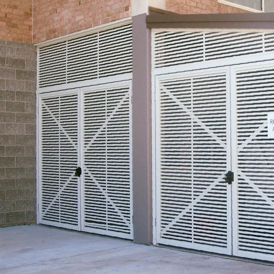 A White Garage Door With a Sign That Says Off — Hunter Valley Lattice in Port Stephens, NSW