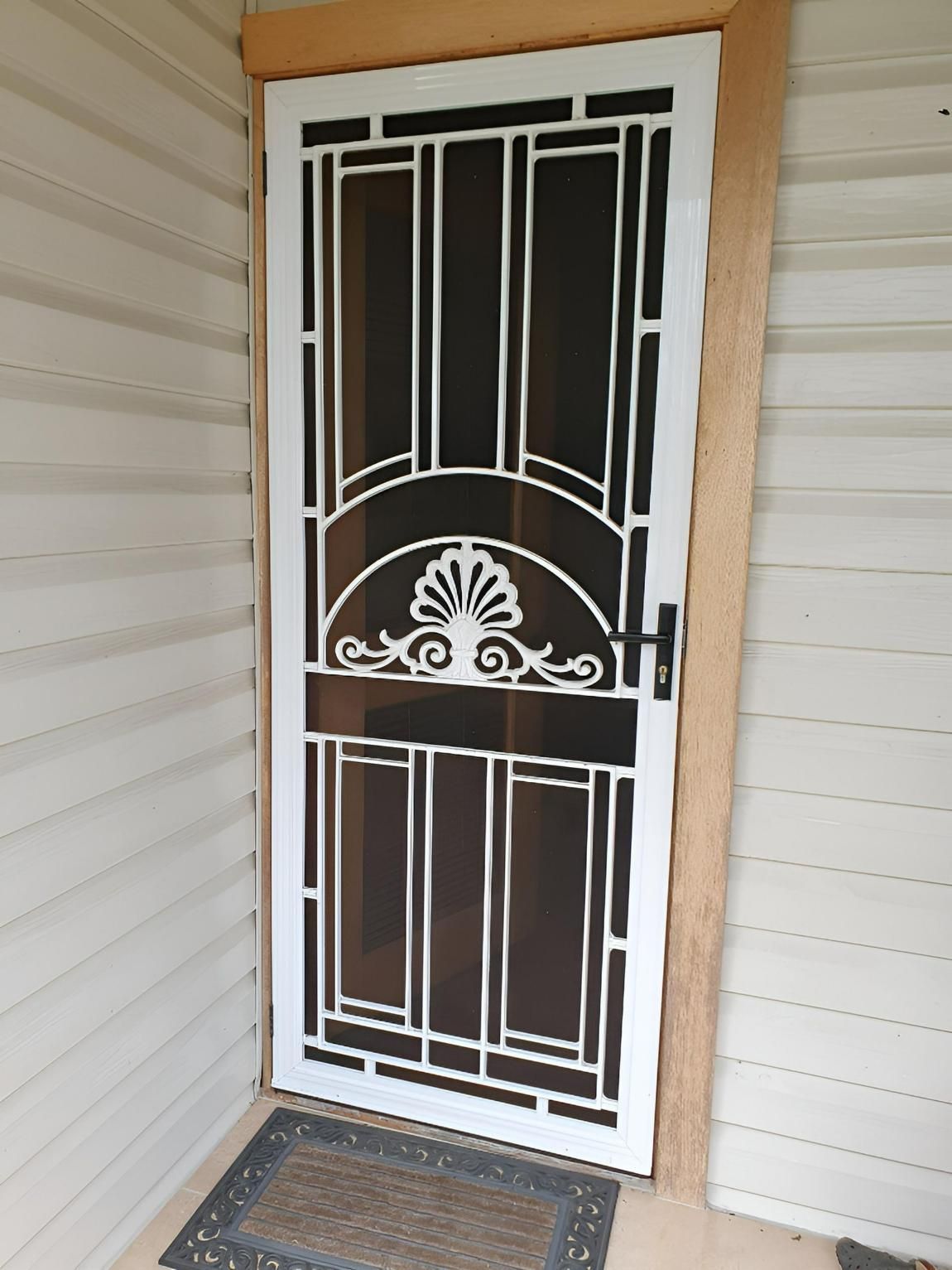 A White Door With a Black Screen on It — Hunter Valley Lattice in Lake Macquarie, NSW