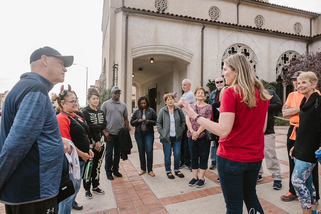 Lauren McCabe Herpich greets tour guests outside Julia Morgan's Chapel of the Chimes in Oakland.