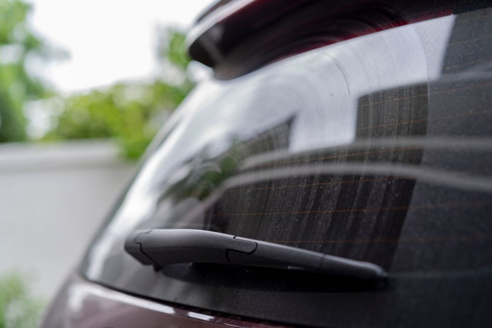 A Close Up Of The Back Window Of A Car With A Wiper Blade — Raymond Terrace Windscreen Services In Raymond Terrace, NSW