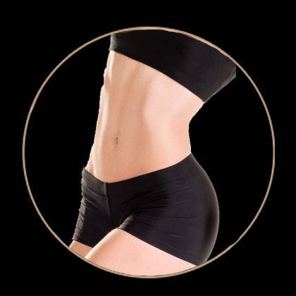 A woman 's stomach is shown in a circle on a black background