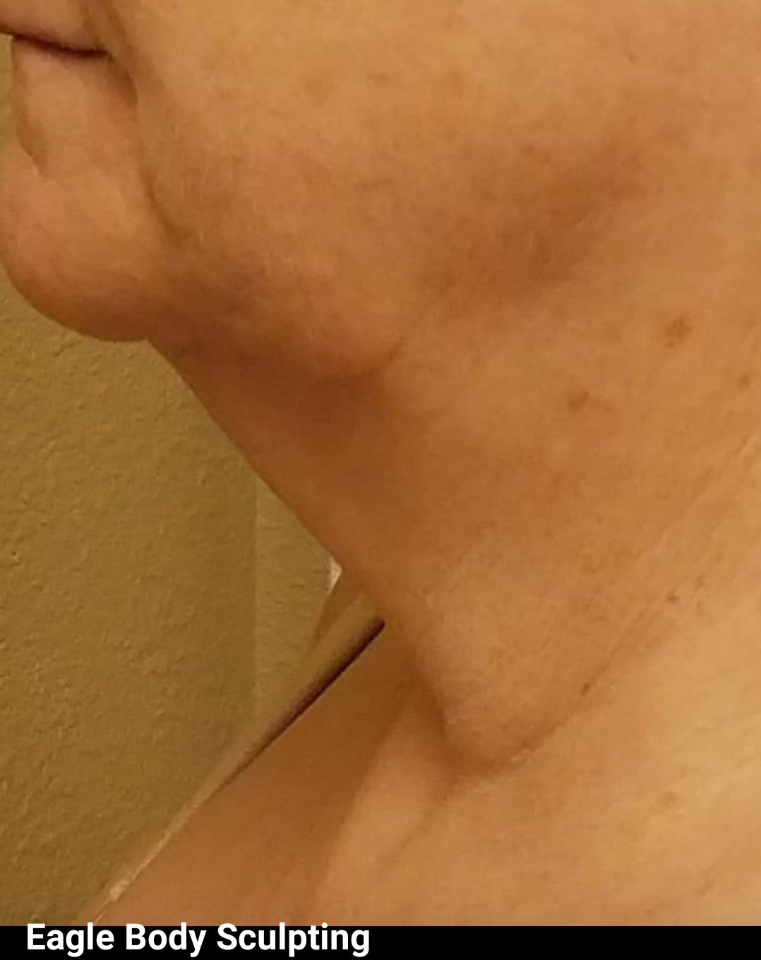 A close up of a woman 's neck and neckline
