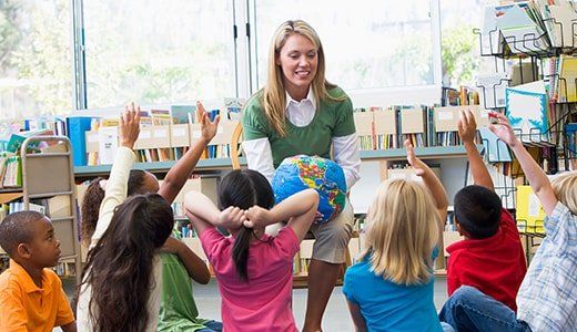 Teacher and student in class - Day Care Center in Northglenn, CO
