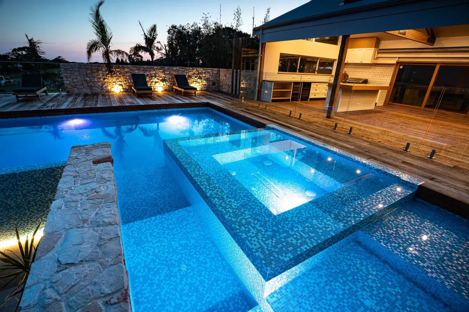 Bright Swimming Pool At Night — NQ Pool Supplies in Smithfield, QLD