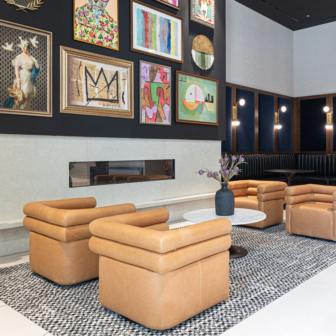 Elegant restaurant interior with tables, chairs, and lighting fixtures. Dark wood paneling and decorative wall art.