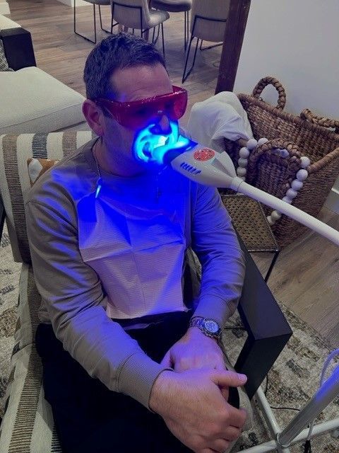 Man Having Teeth Whitening — Marlton, NJ — glw GO LIGHTER + WHITER