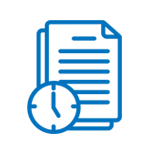 A clock is sitting next to a piece of paper.