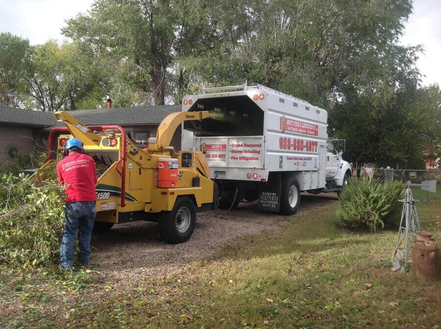 Grinding Grass With Machine — Prescott, AZ — Jonny's Tree & Landscaping Co., LLC