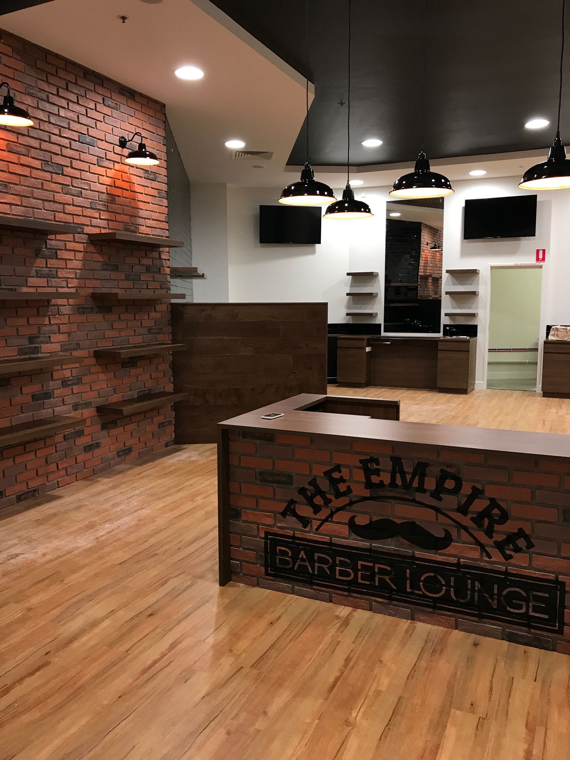 Interior of the Empire Barber Lounge, Featuring Brick Walls — Gray Projects in Woodford, QLD