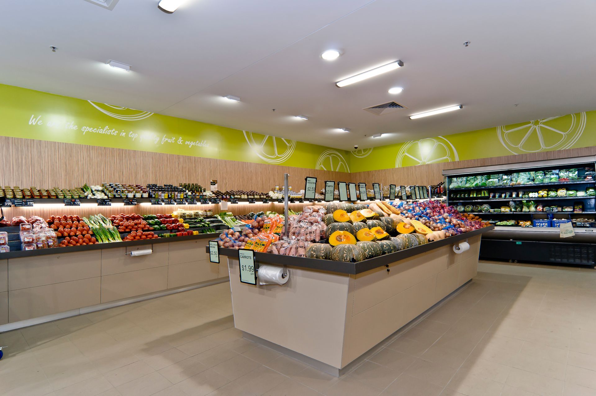 An Aisle in a Grocery Store Featuring Produce Bins — Gray Projects in Woodford, QLD