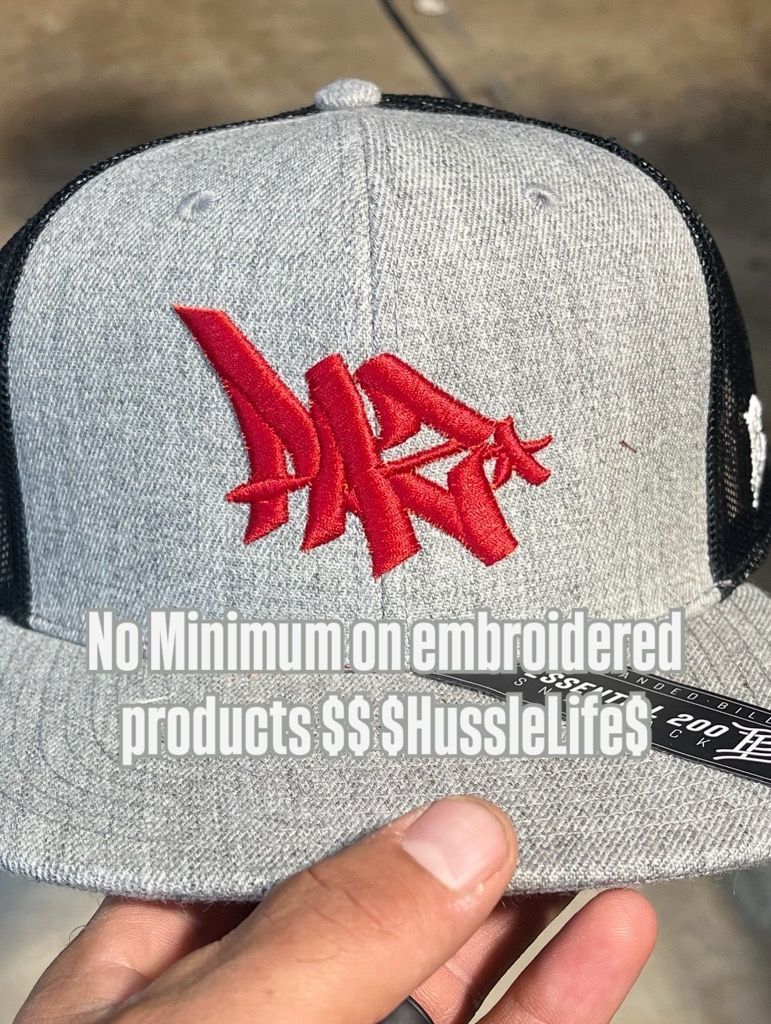 Gray trucker hat with red embroidered logo; text: No Minimum on embroidered products $$ $HussleLife$.