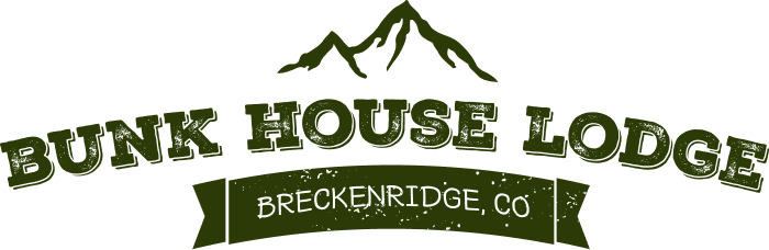 The bunk house lodge logo has a mountain in the background.