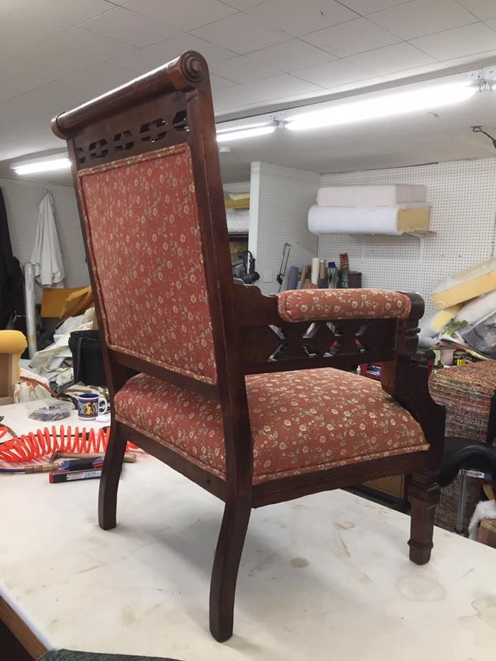 A chair is sitting on a table in a room