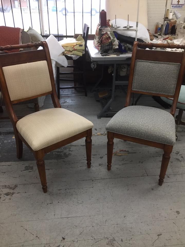 Two chairs are sitting next to each other in a room.