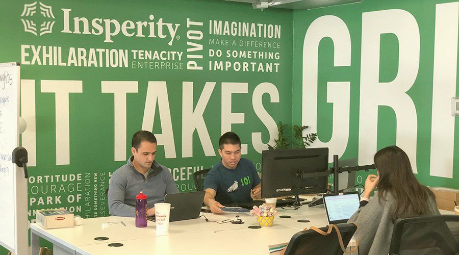 group of people at a desk