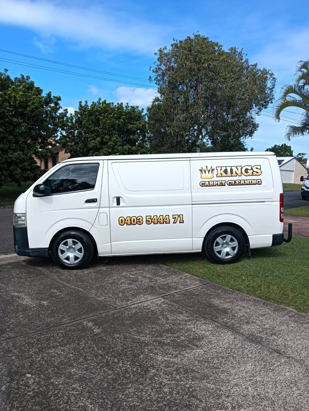 A White Van is Parked on the Side of the Road in a Driveway — King's John Carpet Kleaning & Pest Control In Mooloolaba, QLD
