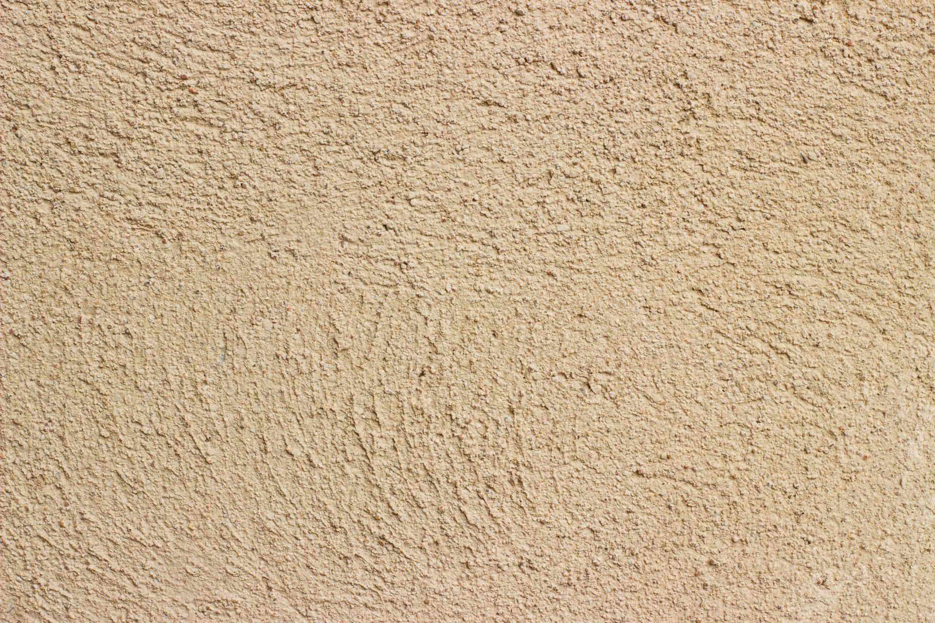 Texture de mur en stuc beige.
