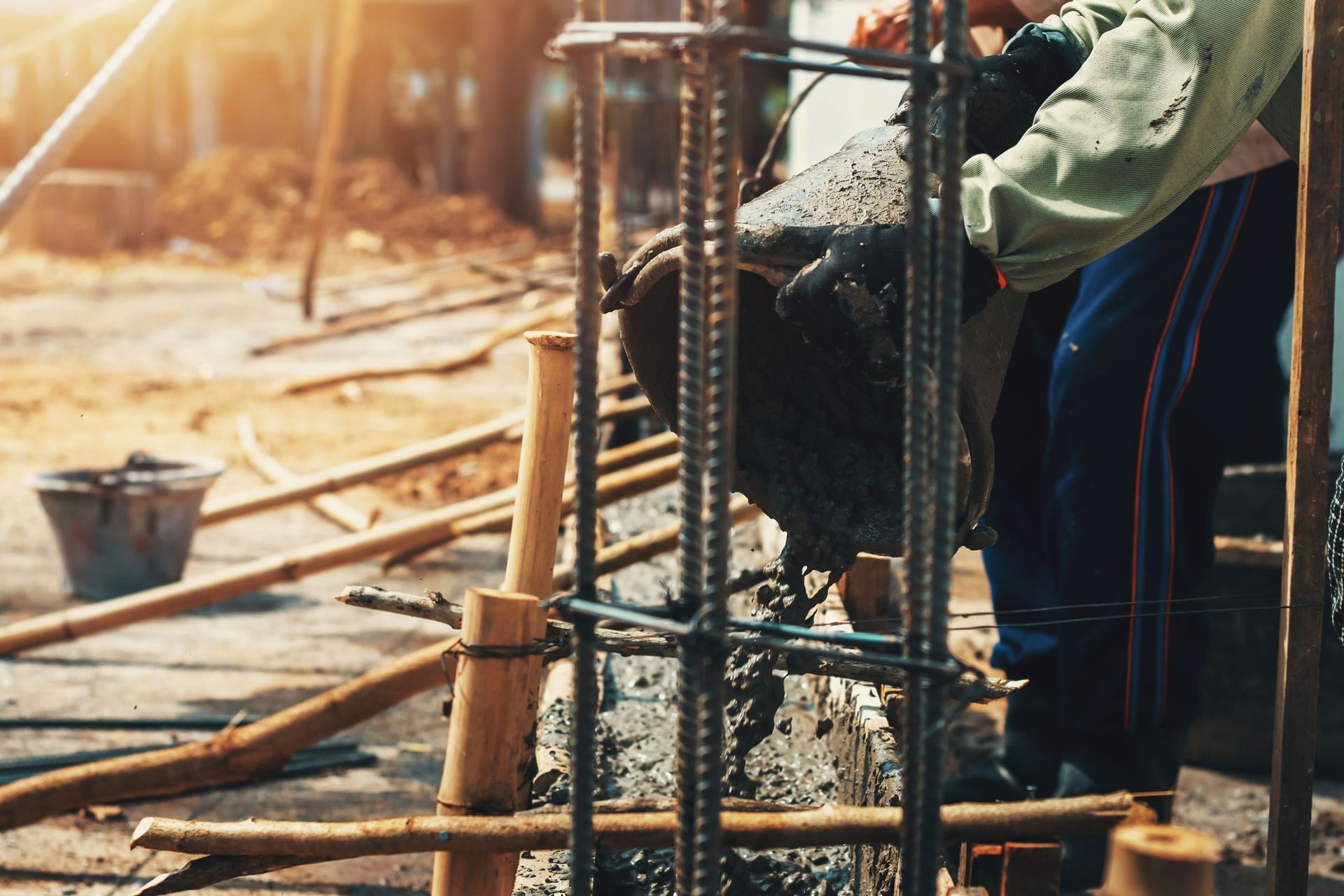 worker mixing pour construction cement