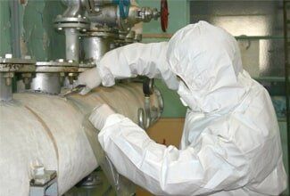Worker Removing Asbestos — Licensed Asbestos Contractor in New Hartford, CT
