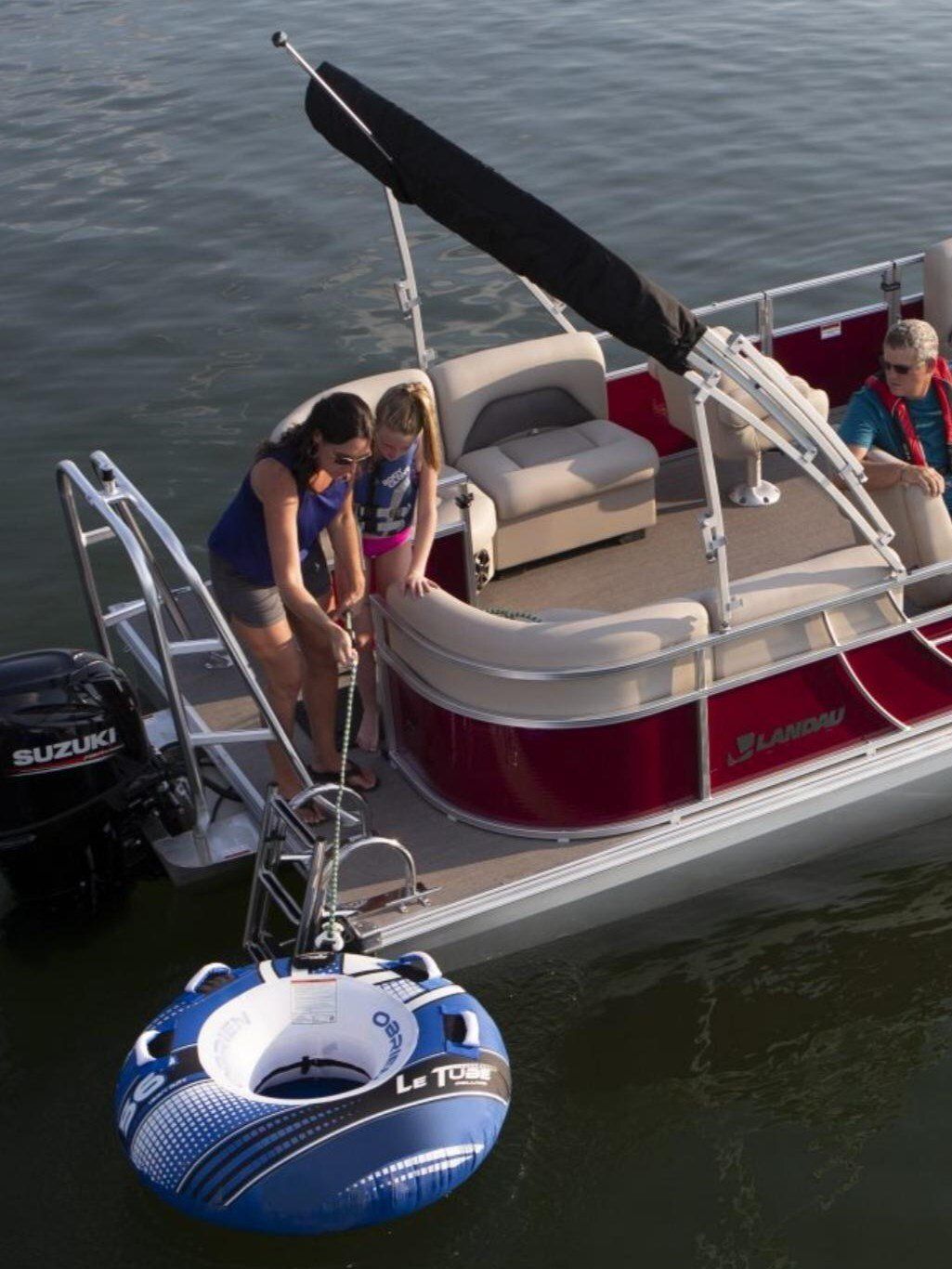 Dirty Duck Boat Rentals | Lake of the Ozarks a pontoon boat with a suzuki outboard motor