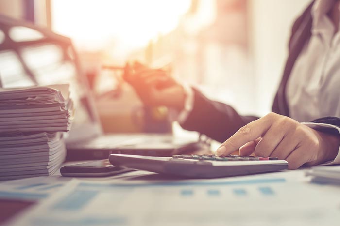 Woman Computing Tax — Appleton, WI — Kostecke CPA