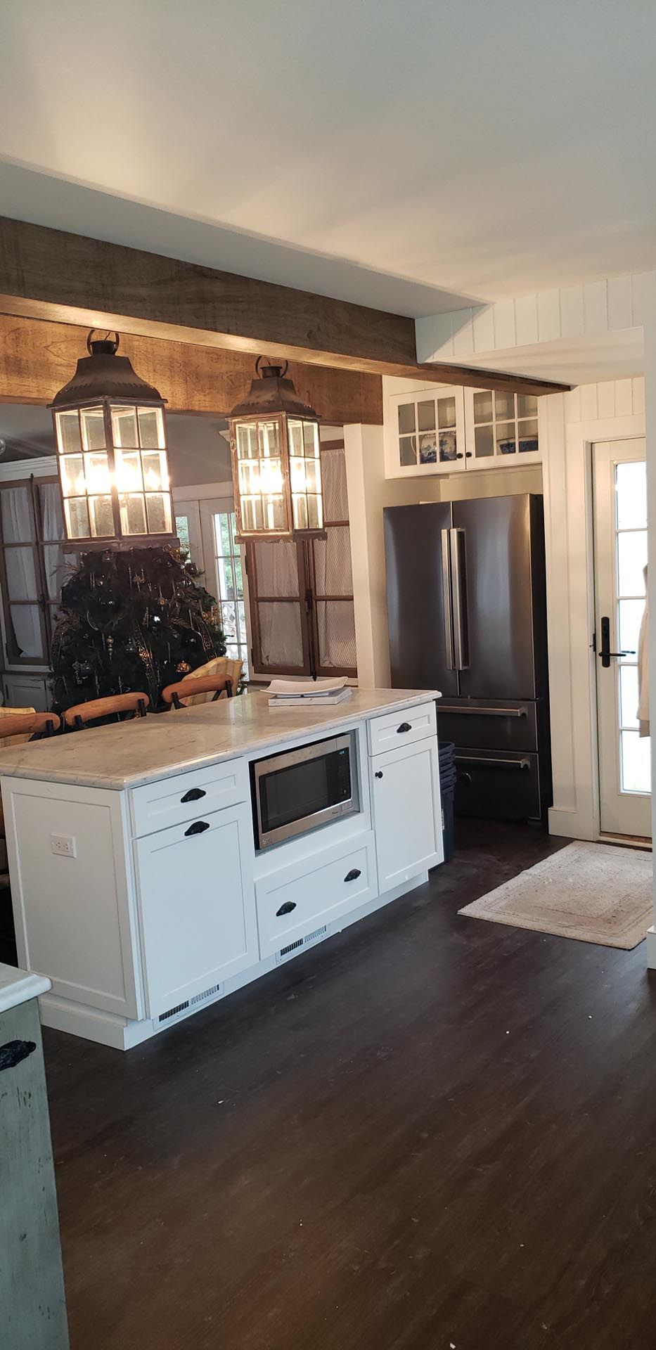 There is a large island in the middle of the kitchen.