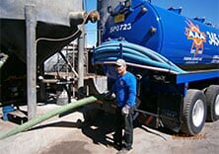 Worker With Truck — Albuquerque, NM — AAA Pumping Service Inc.
