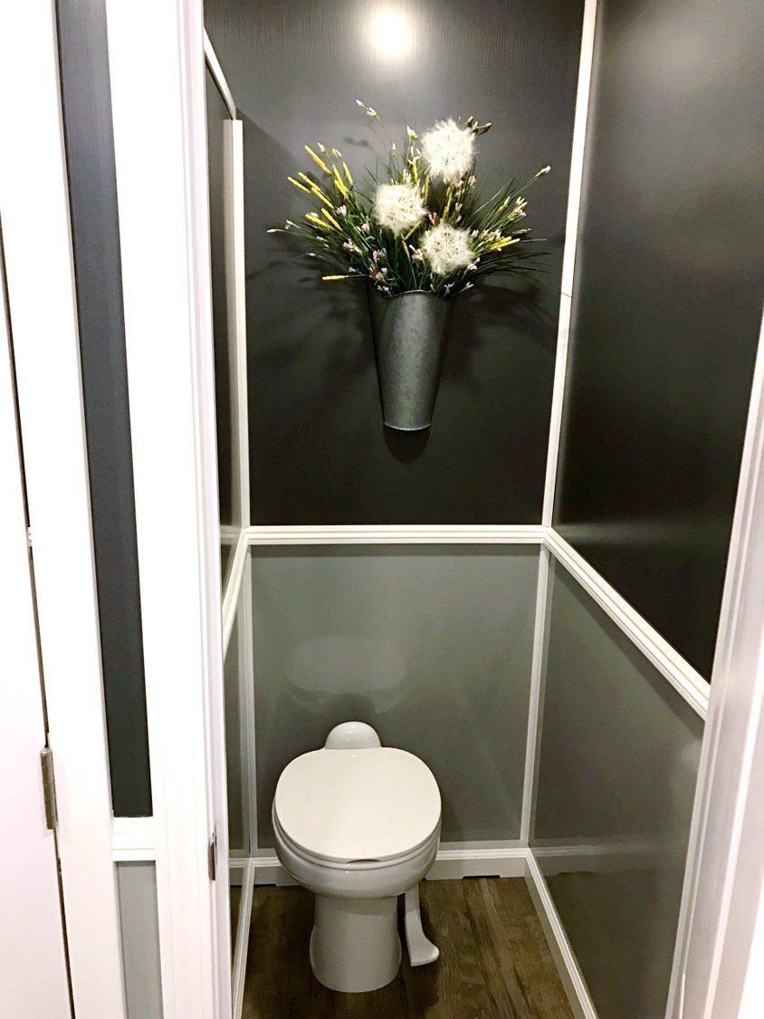 Flowers Inside The Restroom — Albuquerque, NM — AAA Pumping Service Inc.