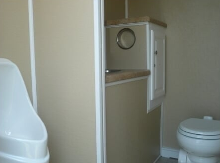 Toilet With White Cabinet — Albuquerque, NM — AAA Pumping Service Inc.