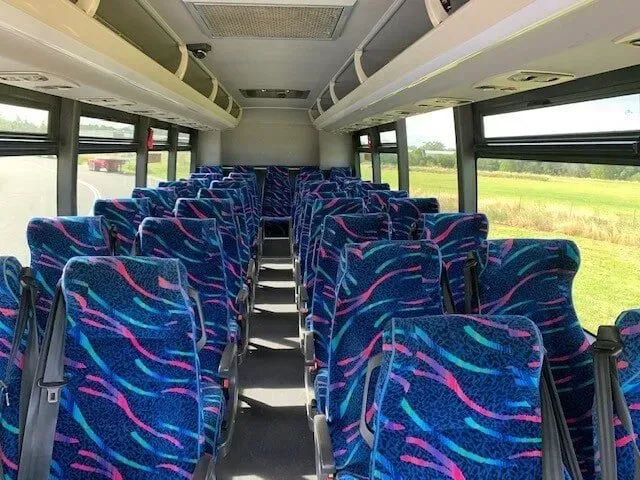 Blue and Pink Seats on A Bus — Wests National Coaches In Chevallum, QLD