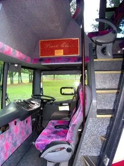 The Inside of a Bus With a Sign That Says First Class — Wests National Coaches In Chevallum, QLD