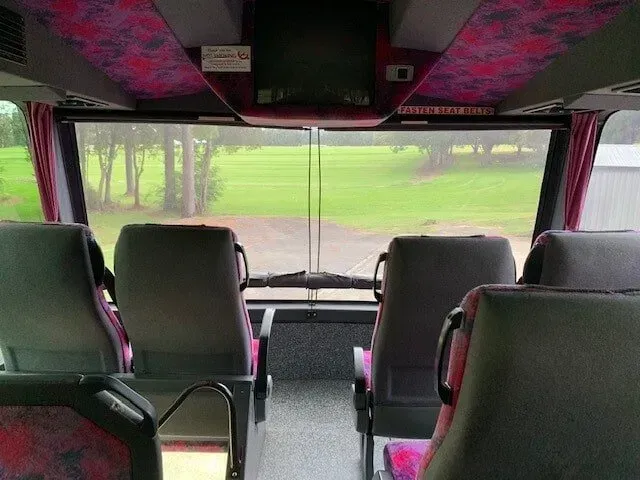 The Inside of a Bus With a View of a Field — Wests National Coaches In Chevallum, QLD