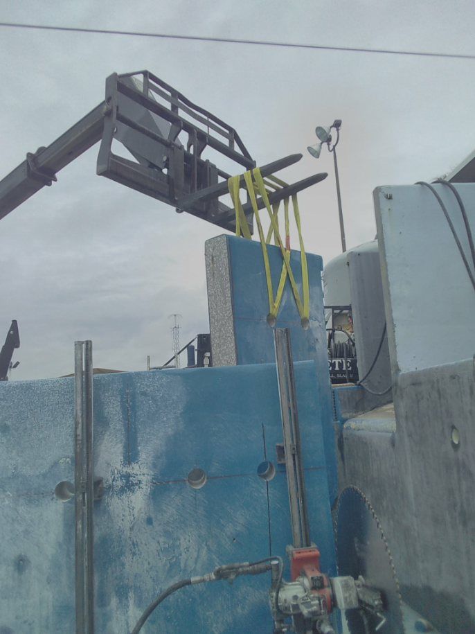 Machine Lifting the Concrete Bars | Kissimmee, FL | Carl's Concrete Cutting & Drilling Inc.
