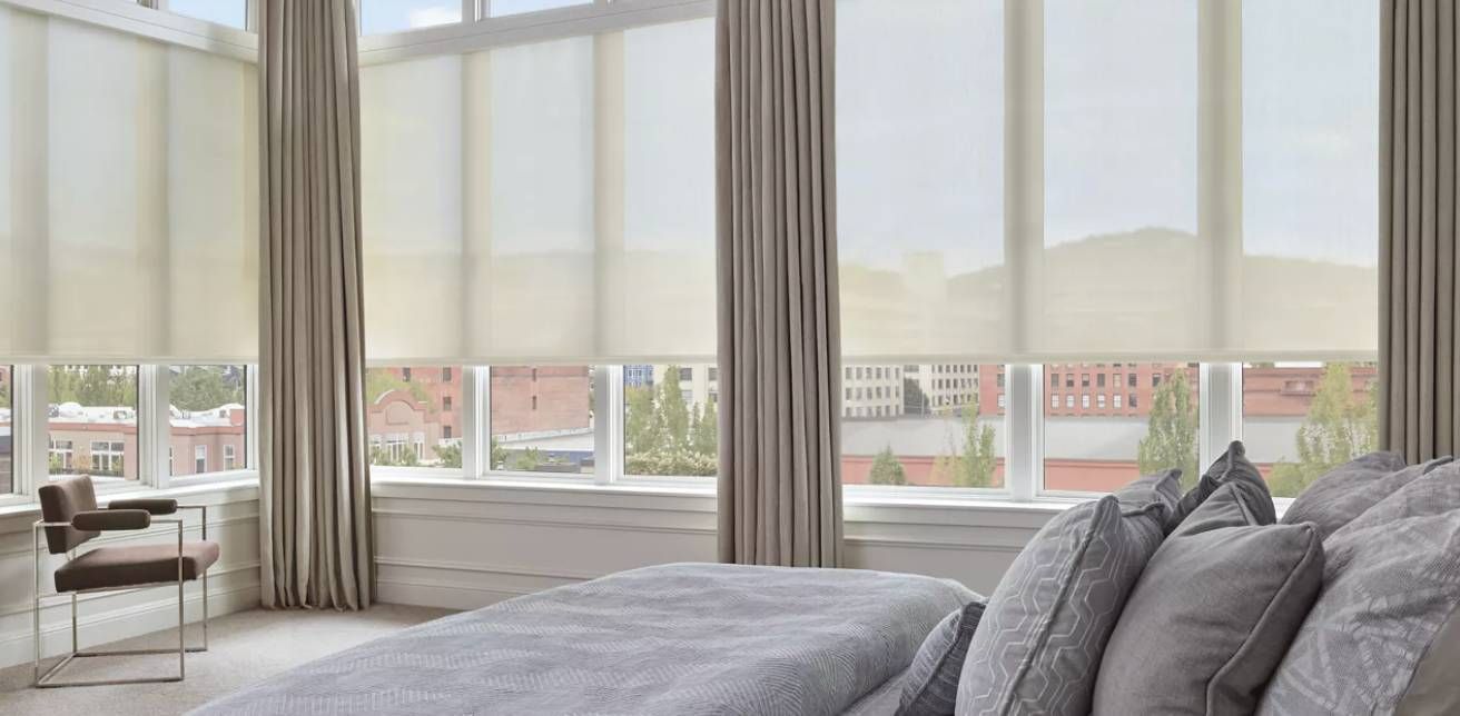 Hunter Douglas Designer Solar Shades covering bedroom windows near Scottsdale, AZ