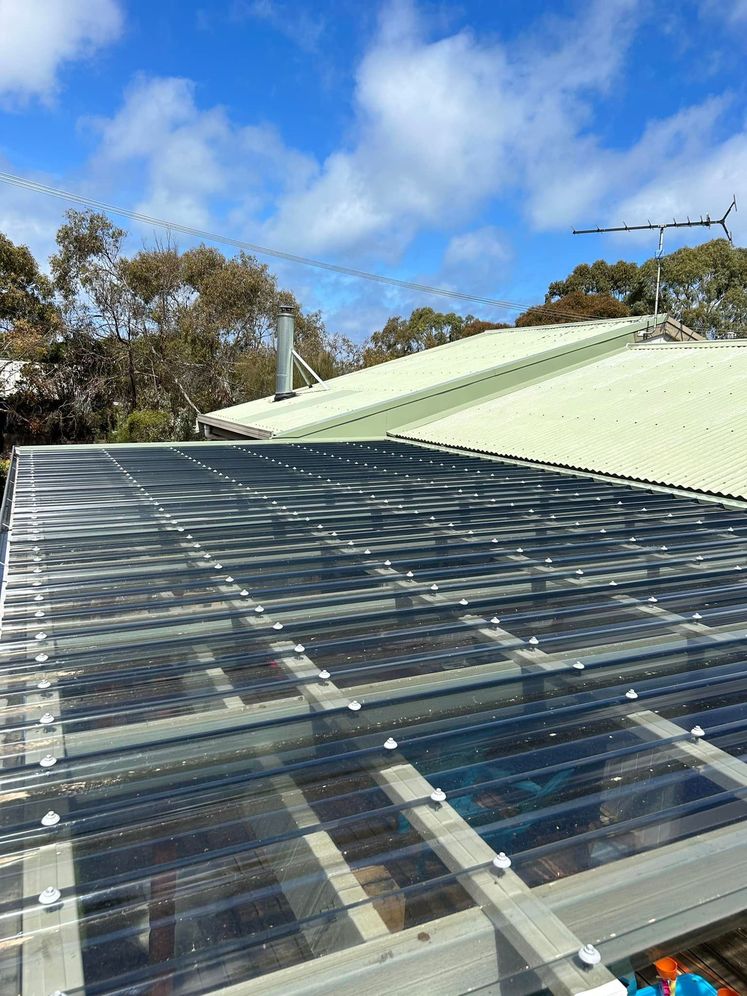 The roof of a house with a clear glass roof.