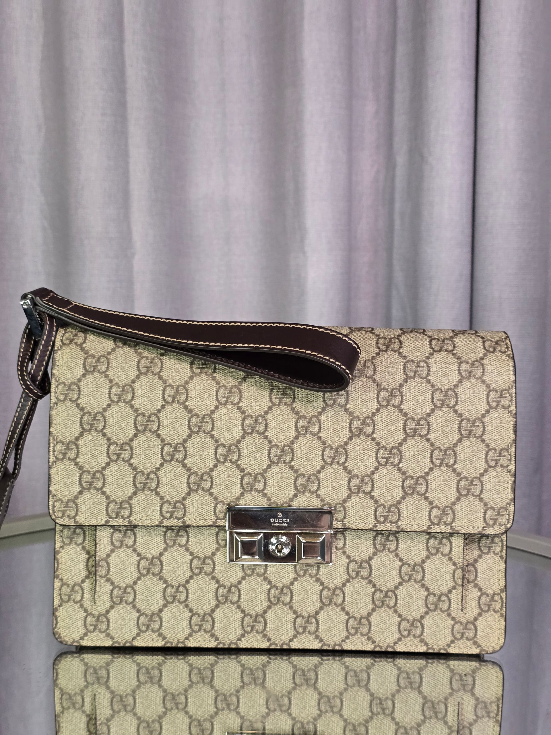 Gucci Supreme Coated Canvas Clutch