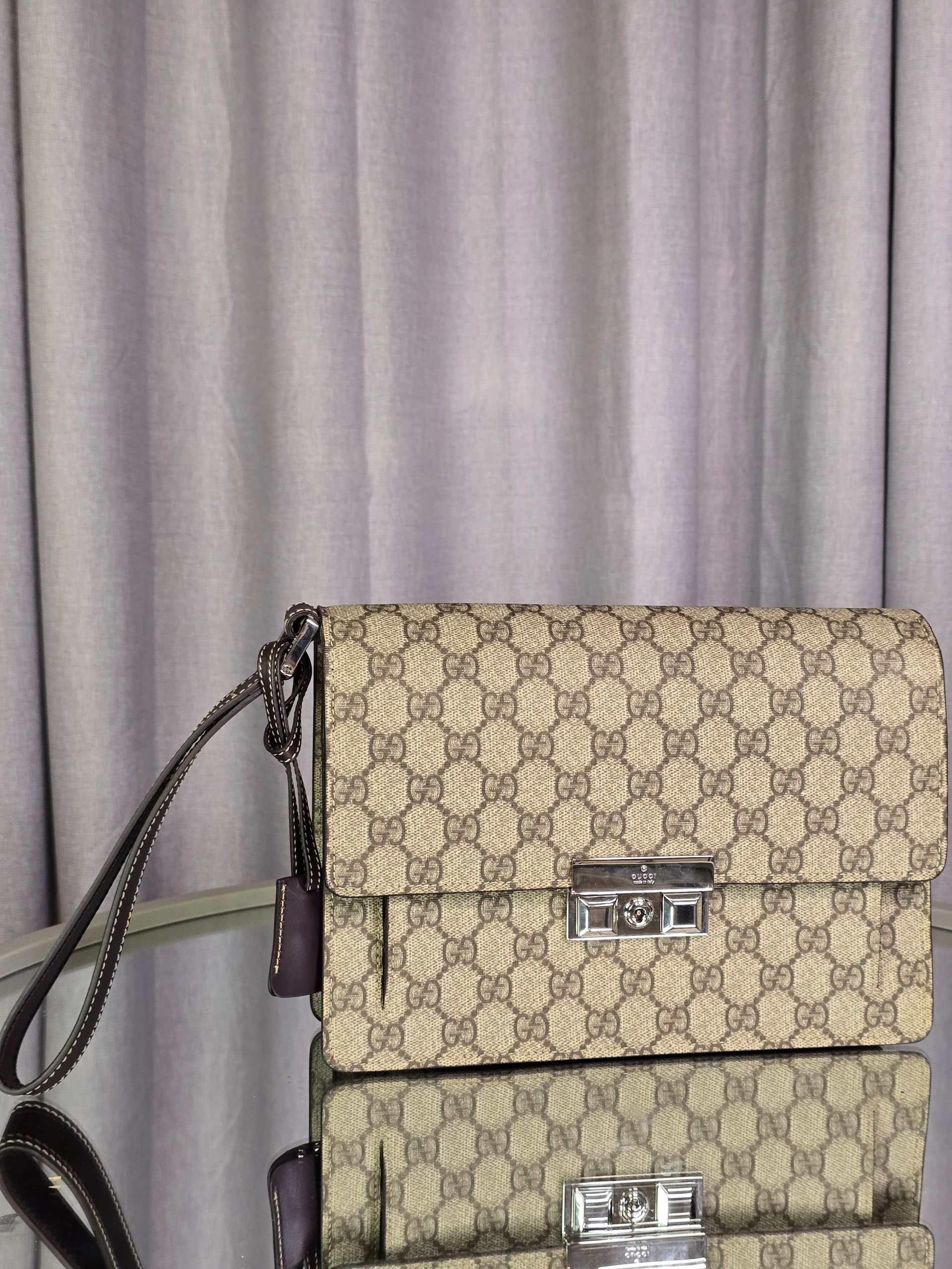 Gucci Supreme Coated Canvas Clutch