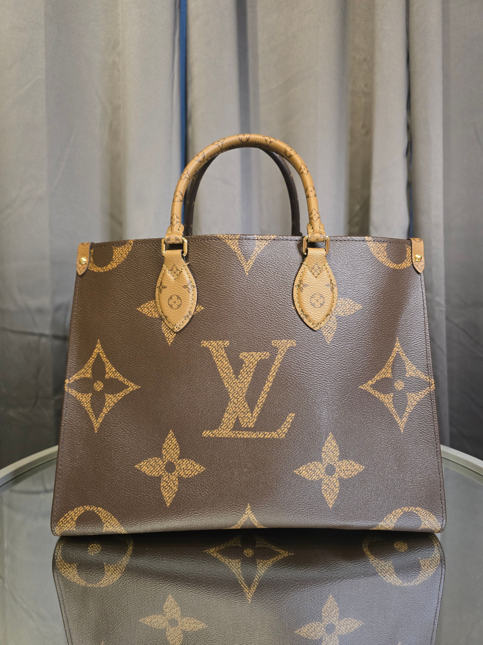 Louis Vuitton Monogram Reversible On The Go Bag MM