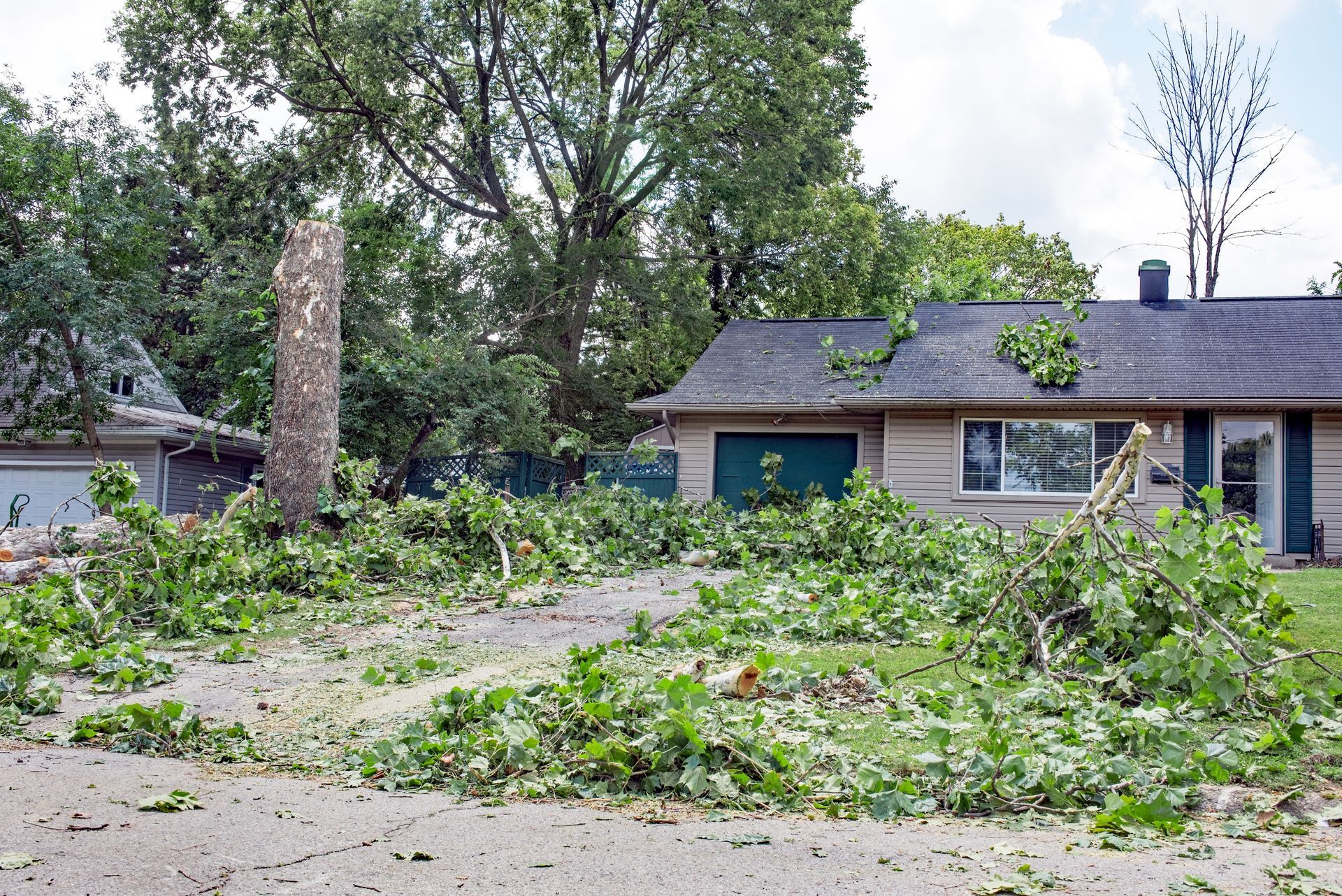 A storm damage cleanup in White Lake, MI by Chop N Drop Tree Service