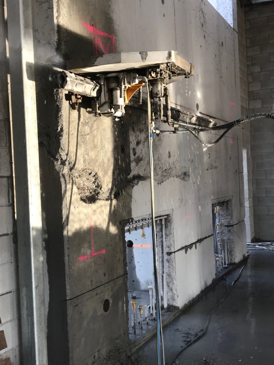 Track Wall Saw Cutting A Wall Opening— Concrete Cutting Services in Bundaberg, QLD